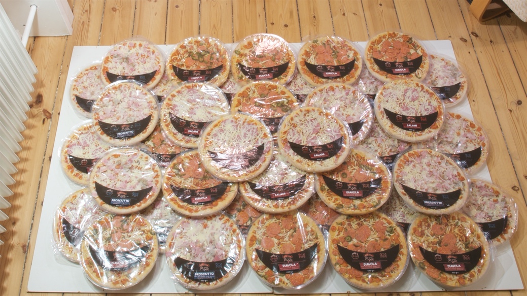 dozens of thrown away pizza